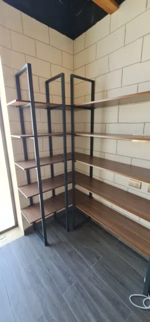 Almost new shelving for a store made of high quality solid wood and steel.