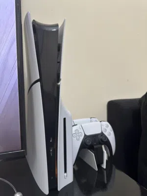 Play Station 5 Disc version with 2 Dual Sense controllers and charging station