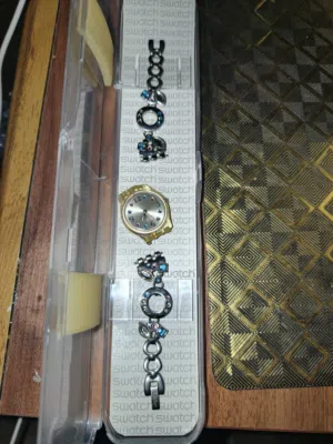 ساعة سواتش Swatch ستاتية  أصلية مستعملة مكسور مكان  الكستك