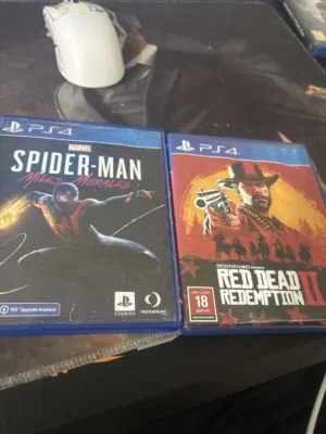 Two ps cds rdr 2 and Spider-Man