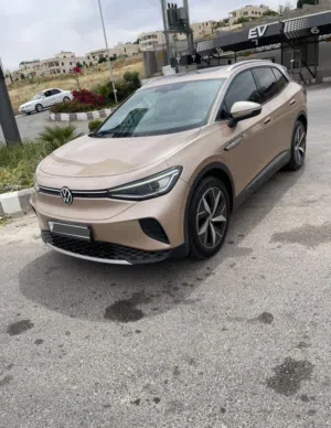 سيارة VW ID4 pure plus موديل 2022 مميزة فحص كامل لون ذهبي مميز دهان الوكالة