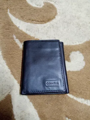 محفظة رجالية ثلاثية الطيات (Trifold Wallet) من ماركة كالفن كلاين (Calvin Klein) جلد اصلي طبيعي 100 ٪