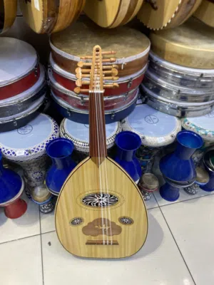 الة موسيقية الات وترية عود جيتار كمان سمسمية ا عود لعندليب خشب زان وجوز صناعة مصرية مع شنتة وريشة