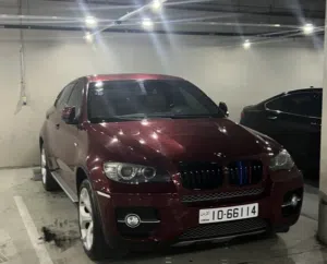 بي ام دبليو X6 2008 فئة X6 xDrive35i حمراء للبيع سيارة مستعملة مرخصة