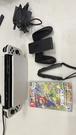 Nintendo Switch OLED + Mario + 256GB Memory – بكج كامل