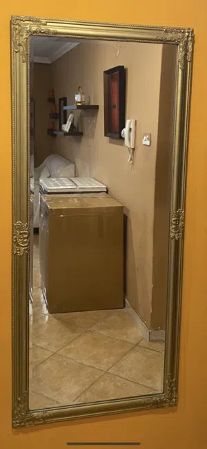مرايا +كونسول لون ذهبي