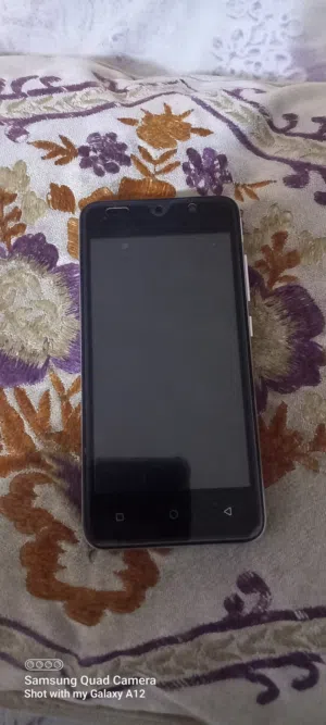 Used Silver Mobile Phone in Excellent Condition with Accessories