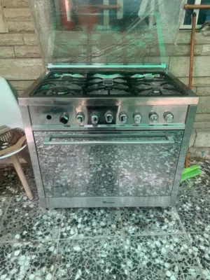 طباخ ميلانو خمس عيون ومفرغة طباخ .