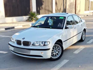 BMW E46 320i  موديل 2004 محرك 6/20 وارد يباني مزايا فل طرش واصله لها اسبوعين جمرك رساله مفتوحه