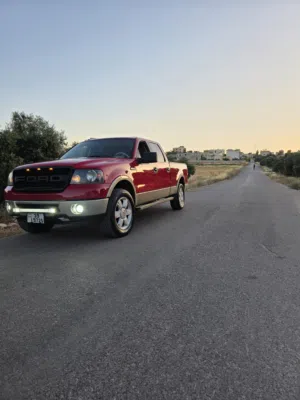 فورد F-150 2007 لاريت أحمر مستعملة مرخصة مع مواصفات أمريكية