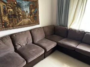 Brown L-shaped sectional sofa - used, good condition