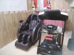 جهاز جري مع كرسي مساج مستخدم قليل نظافة 99%