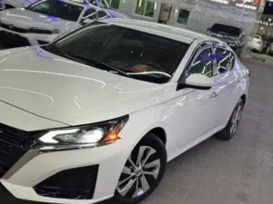 نيسان التيما وارد أمريكي نضيف جدا استعمال قليل جدا SV مواصفات عاليه للبيع في عجمان الجرف سوق السيارا