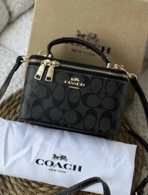 شنطة COACH الجديدة يصير تمسكينها بيدج و تصير تلبسينها كروس