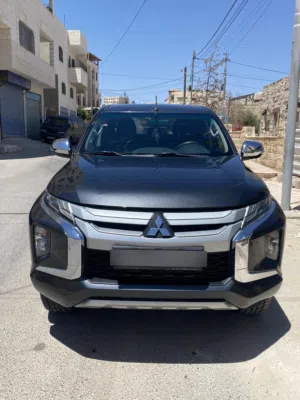 موتور ميتسوبيشي L200 Double Cab GLX 2023 ديزل مرخصة بحالة ممتازة