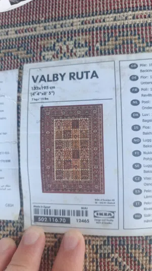 سجاد لون خمري