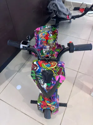 Electric Drift Trike / Scooter with Charger – Only 6 Months Old!