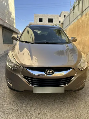 2009-hyundai-توسان-lx20-اربع-ابواب،-اللون-فيراني،-الكراسي-جلد-والسيارة-92-000-كيلو-فقط-وبحالة-رائعة