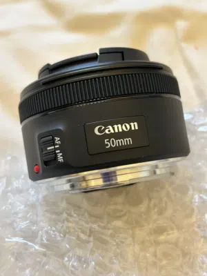 عدسة كانون الأصلية Canon EF 50mm f/1.8 STM جديدة تماماً – غير مستخدمة