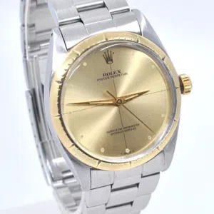 ORIGINAL ROLEX OYSTER PERPETUAL A stainless steel and gold automatic bracelet watch