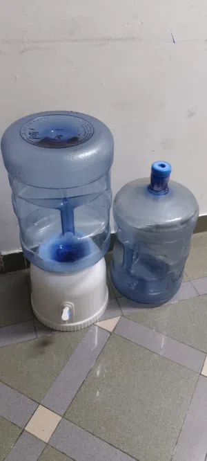 Water Dispenser with 2 Gallons - Used