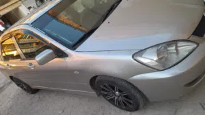ميتسوبيشي لانسر 2006 موديل فضي مستعملة بحالة جيدة مع تأمين ومرخصة