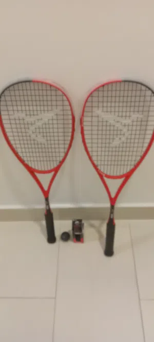 Squash rackets and balls for sale