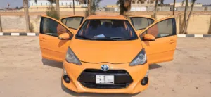 Prius C 2016 .. Orange