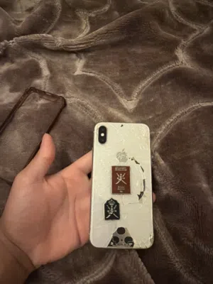 Apple iPhone X 128 GB in Muscat