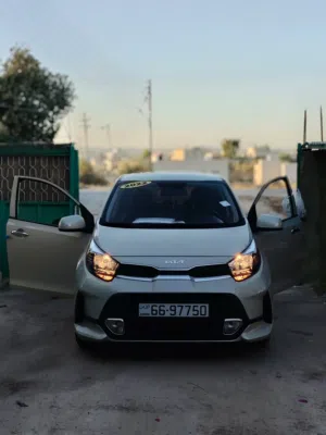 سيارة كيا مورنينج 2022 GT-Line هاتشباك، لون بيج، محرك 1000  سي سي، مرخصة ومستعملة