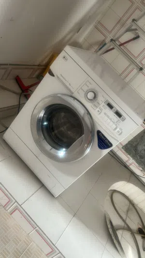 للبيع غسالة ومجففه ماركة ال جي مستعمله