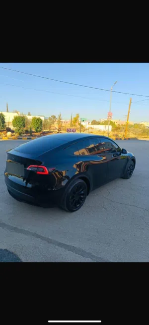 تيسلا موديل Y 2021 لون أسود كهربائية بحالة ممتازة بمواصفات أمريكية قابل التفاوض