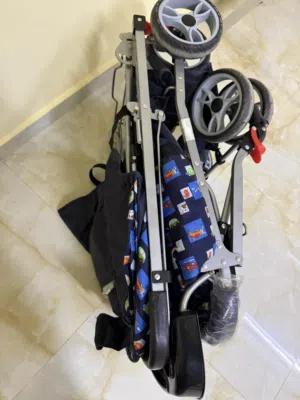 عربة أطفال جديدة