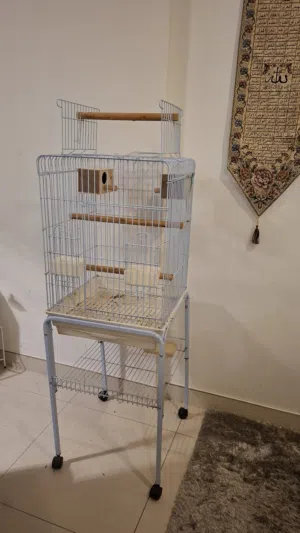 big cage with stand and nesting boxes