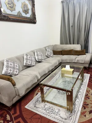 L shaped sofa with cushions