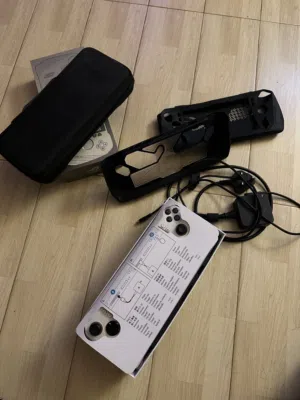 جهاز ASUS ROG ALLY Z1 Extreme 2TB بجميع اغراضه وملحقات أخرى