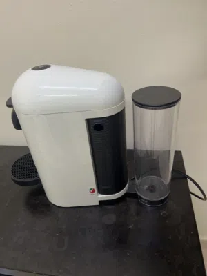 مكينة نسبرسو الاصليه لصنع القهوة The original Nespresso machine for making coffee