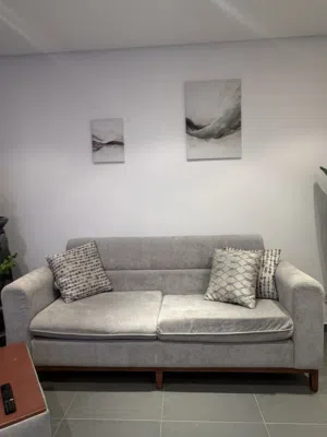 Complete living room furniture set, including sofas, a coffee table, and guest chairs.