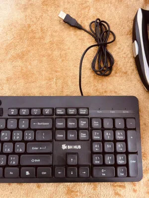 كيبورد أسود مع ماوس جديد