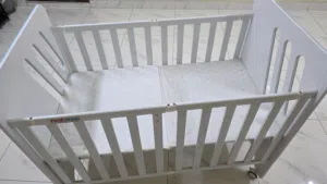 Gently Used "First Step" Foldable Baby Cot / Crib with Mattress
