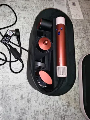 Dyson Airwrap i.d.TM multi-styler and dryer Straight+Wavy in Strawberry bronze and blush pink