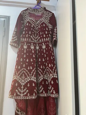 Indian dress ( Red and gold) very pretty ( hand made)