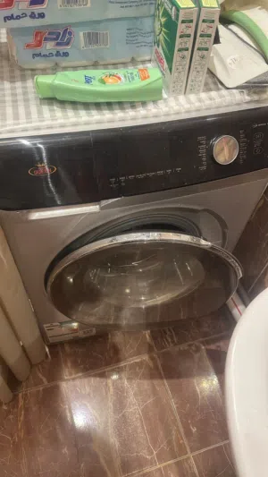 غساله ملابس هوم كوين مستعمل مع ضمان سنتين