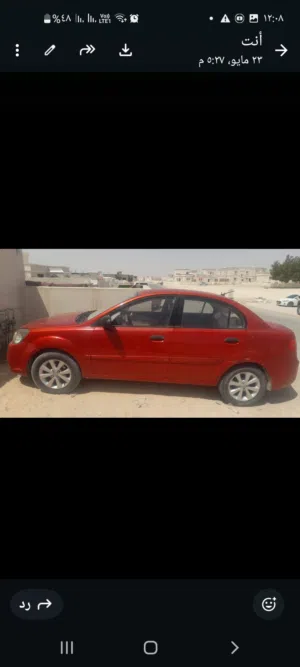 كيا ريو 2012 موديل LX بحالة ممتازة مع مواصفات خليجية في لون أحمر
