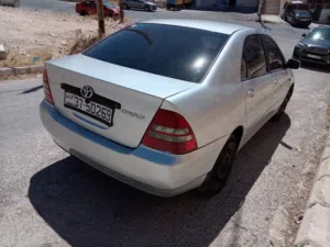 تويوتا كورولا موديل 2003 سياره اقتصاديه بحاله جيده مناسبه  الموقع عمان طبربور بالقرب من دوار الدبابه