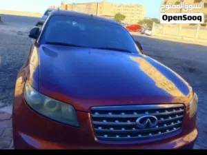 سيارة إنفينيتي FX35 سبورت نسخة سبايت فيتل 2008 برتقالي مع مواصفات خليجية