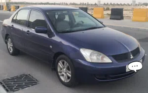 Mitsubishi Lancer 2011 well maintained 1.6L Passing insurance until Sept 2026