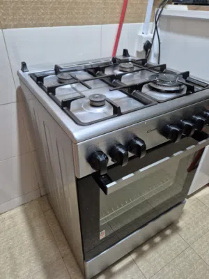 Gas Cooker with Oven & Storage - Candy (3 Burners Working) Price 45 rial