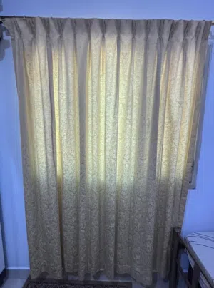 Two pieces of heavy fabric curtains