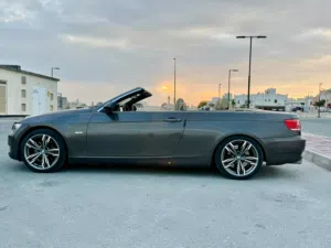 BMW 330i convertible model 2010 couple with two doors and four seat roof can be open
